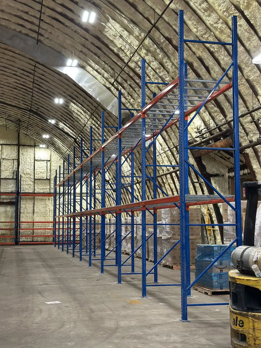 Pallet racking install with forklift